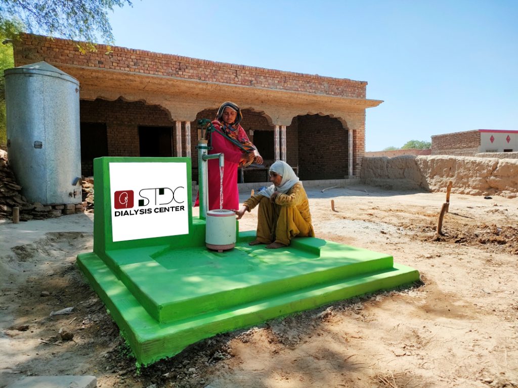 Hand pump water well